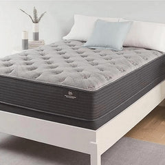 Serta Luxe mattress on a white bed frame