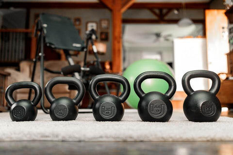 Which is Better Iron Cast Kettlebells or Steel Competition Kettlebells– Sweat