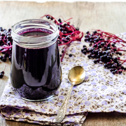 Elderberry syrup with raw honeycomb