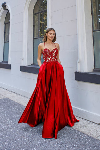 Beautiful teen girl in long, glamorous red dress going to her prom or dance  Stock Photo | Adobe Stock