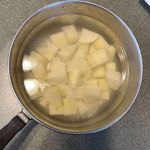 Cut potatoes for mashed potato frosting
