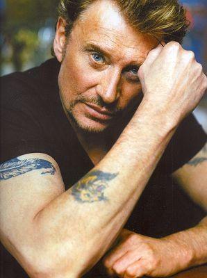 Tatouage de Johnny Hallyday représentant un lion 