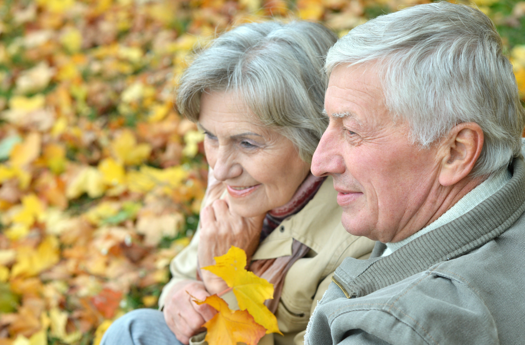 older people in the garden during autumn