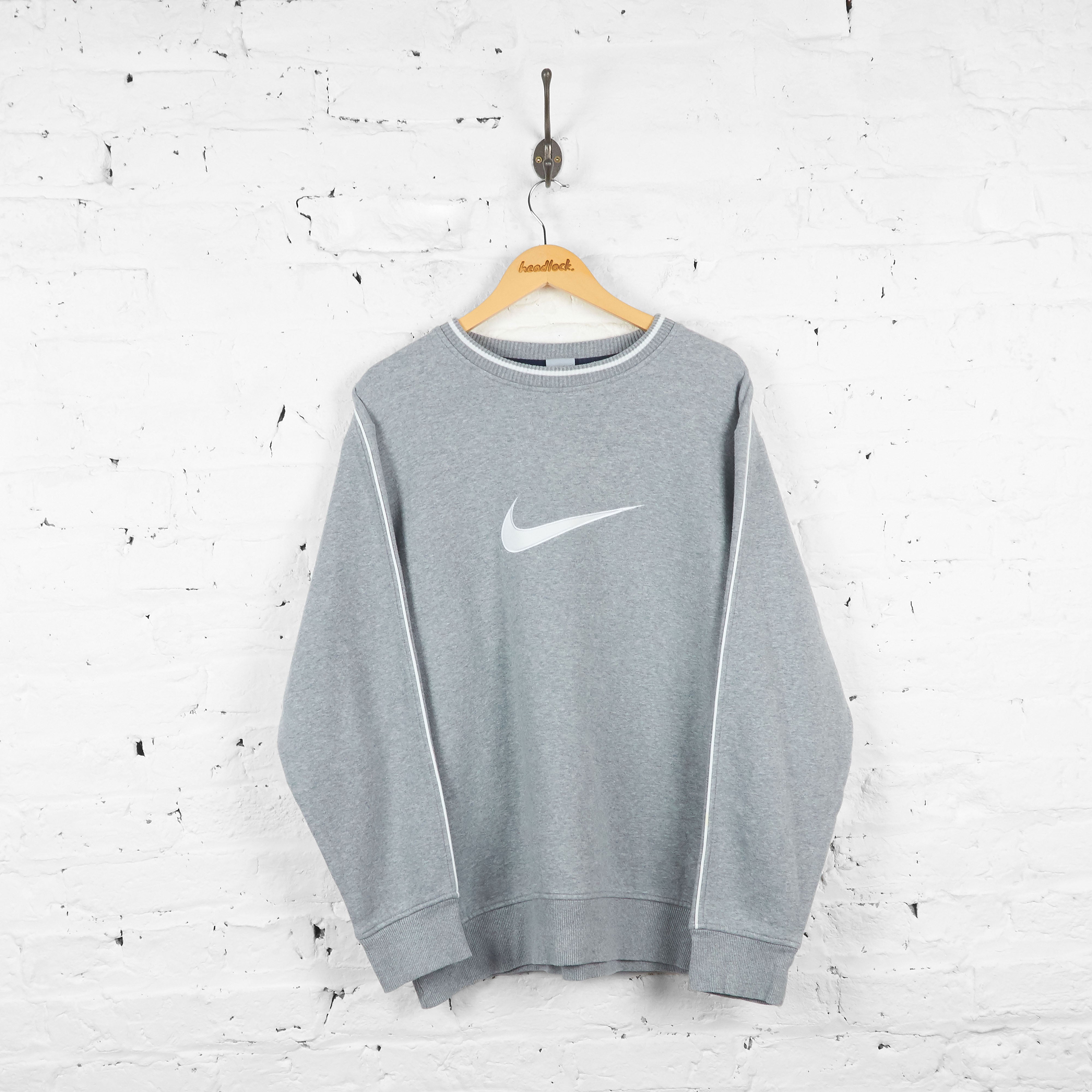 nike tick sweatshirt