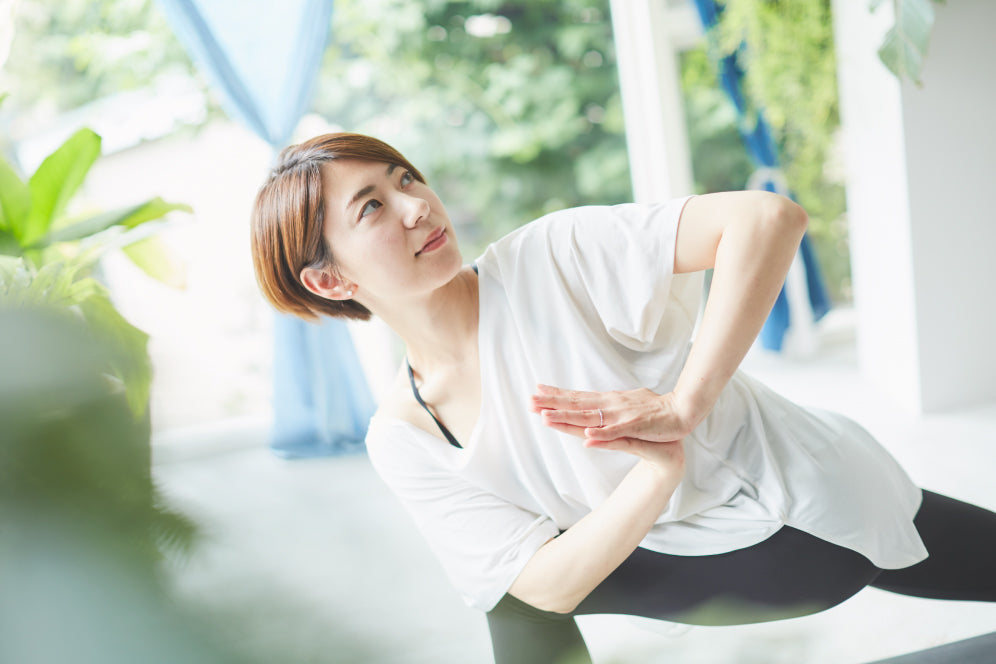 Mayo Uchida in yoga pose 
