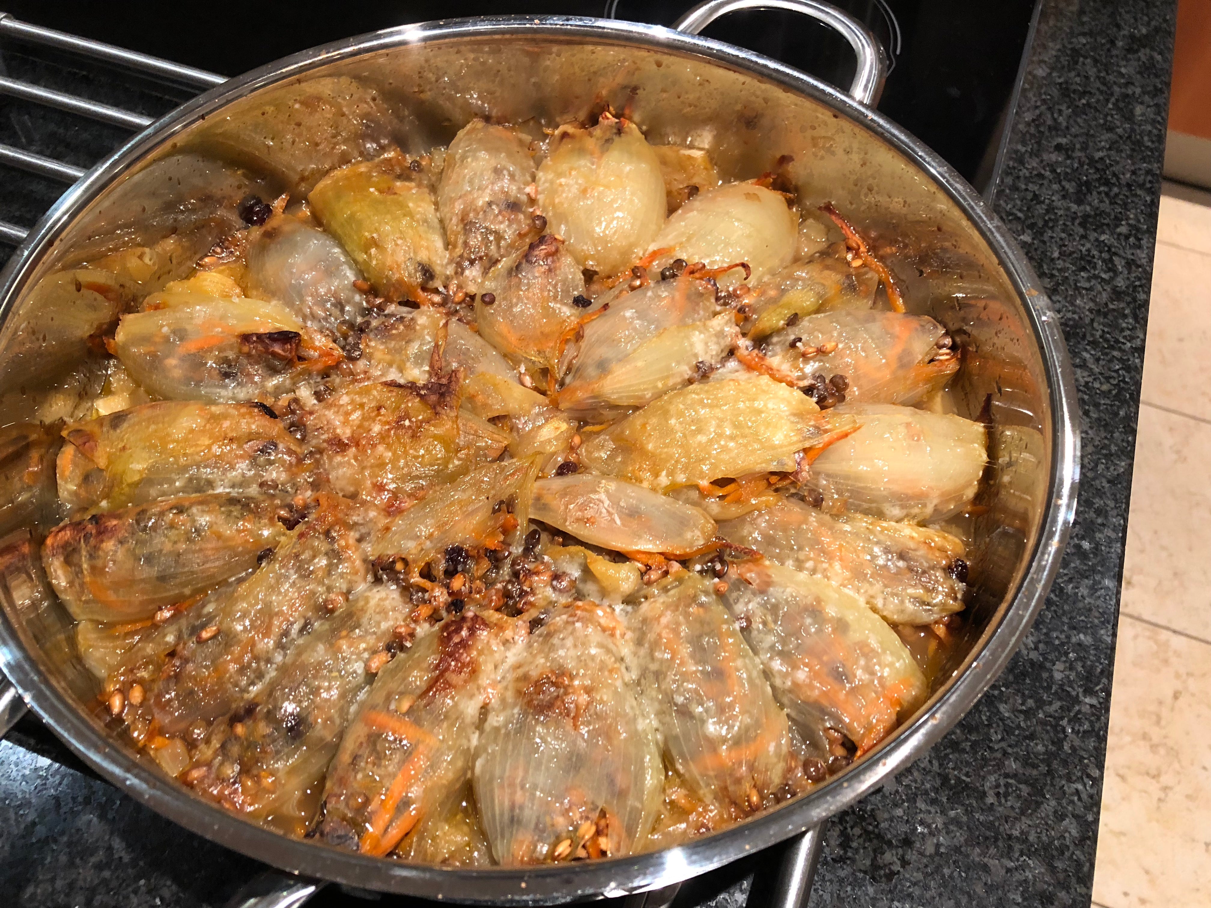 Stuffed onion with rice, lentils, carrots and zucchini