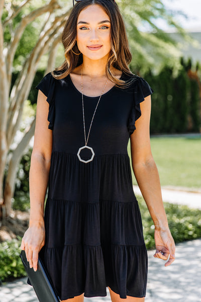 black tiered dress with sleeves