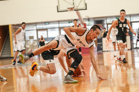 guys playing basketball - march madness