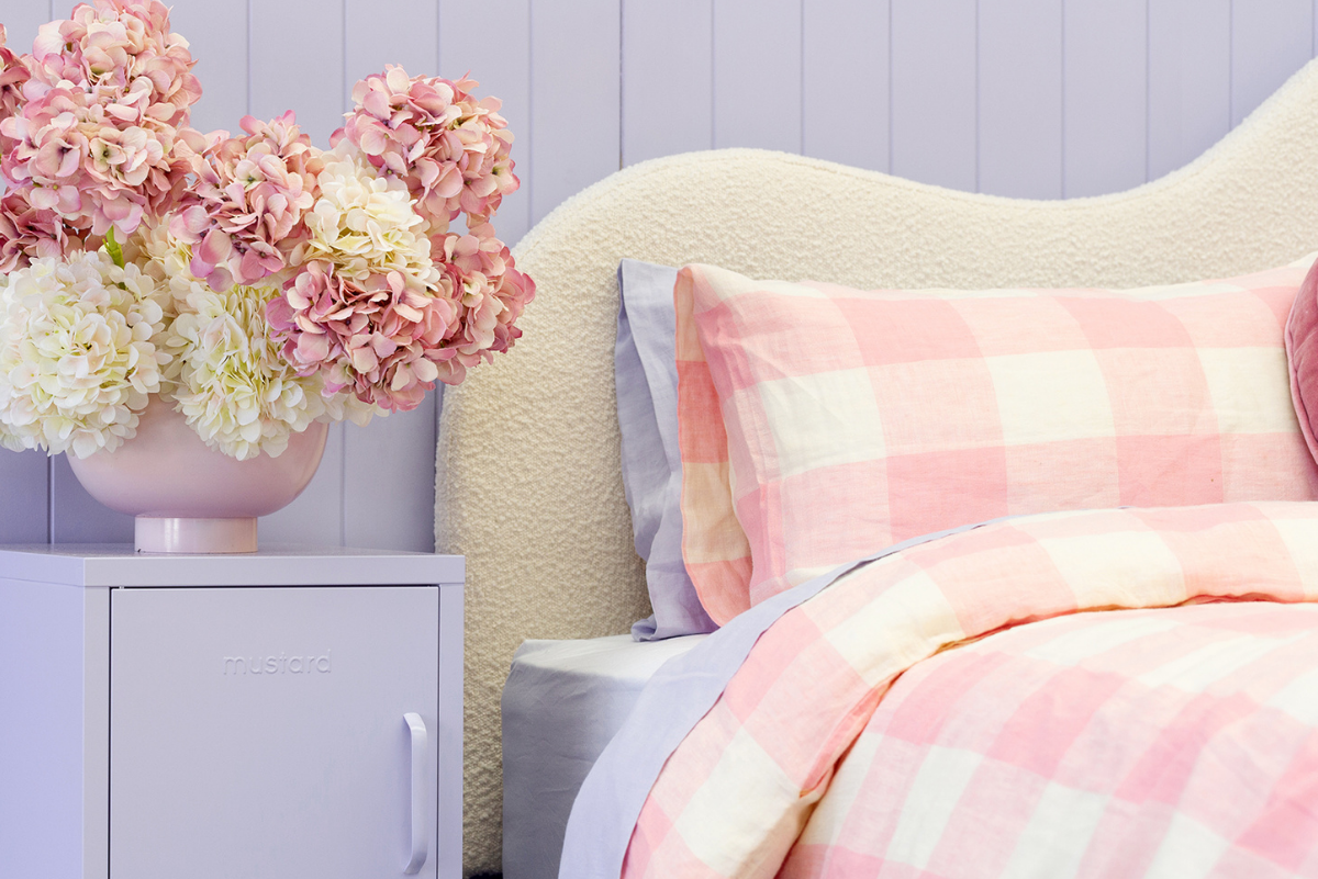Styled Kip + Co bed in pink with Lilac Shorty locker either side - close up