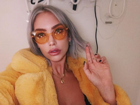 Apphia castillo wearing vulgati mellow yellow bubble sunnies