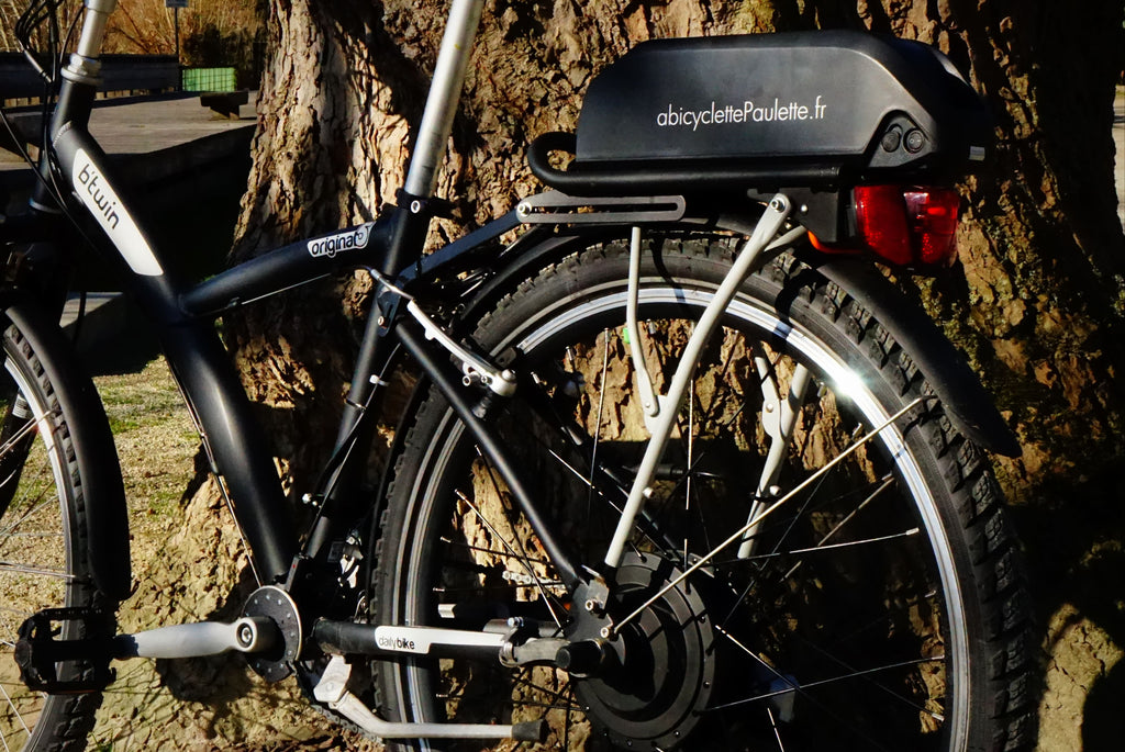 installer une batterie sur un vélo décathlon btwin