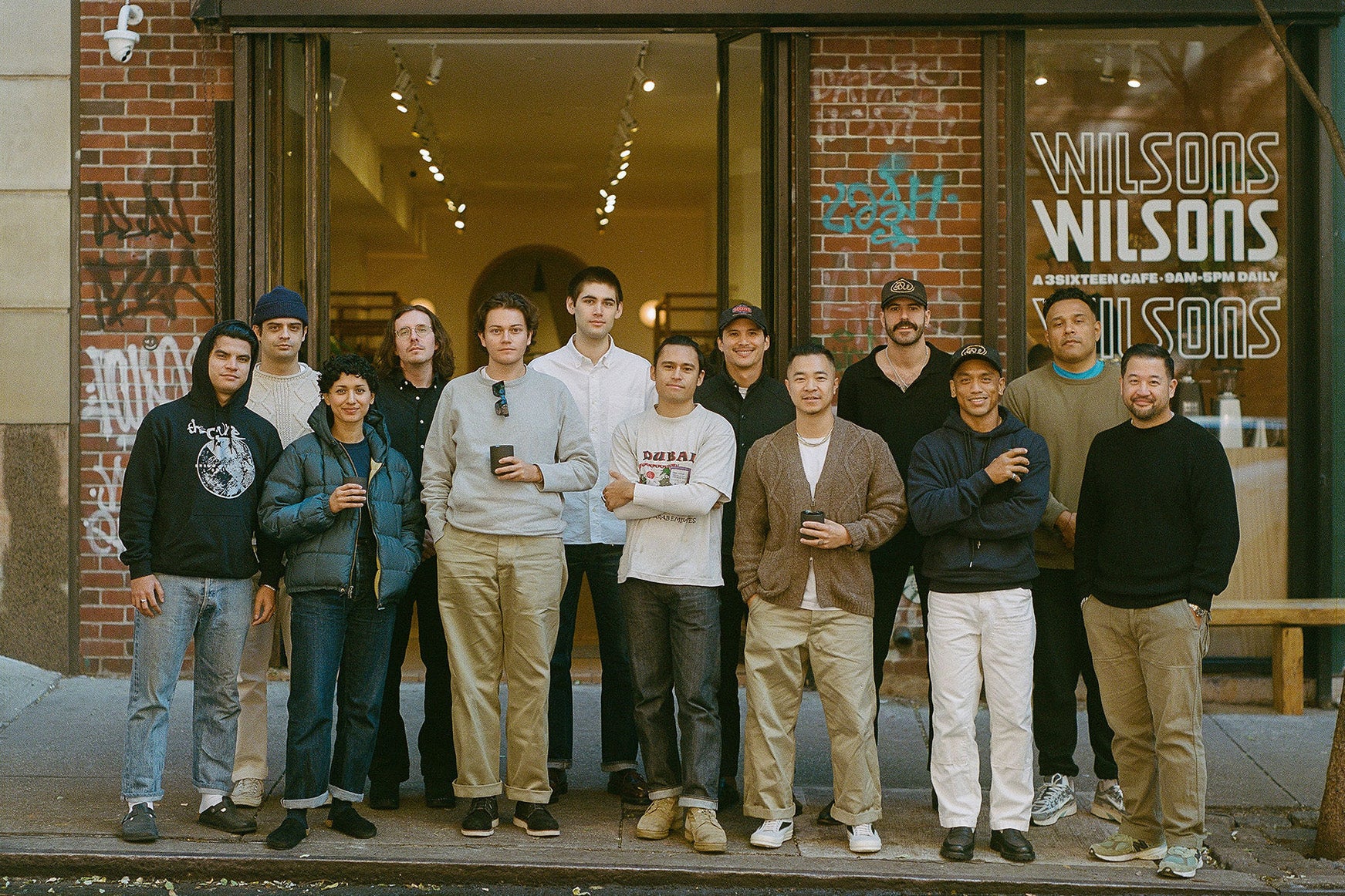 A group of men and women outside the 3sixteen store.