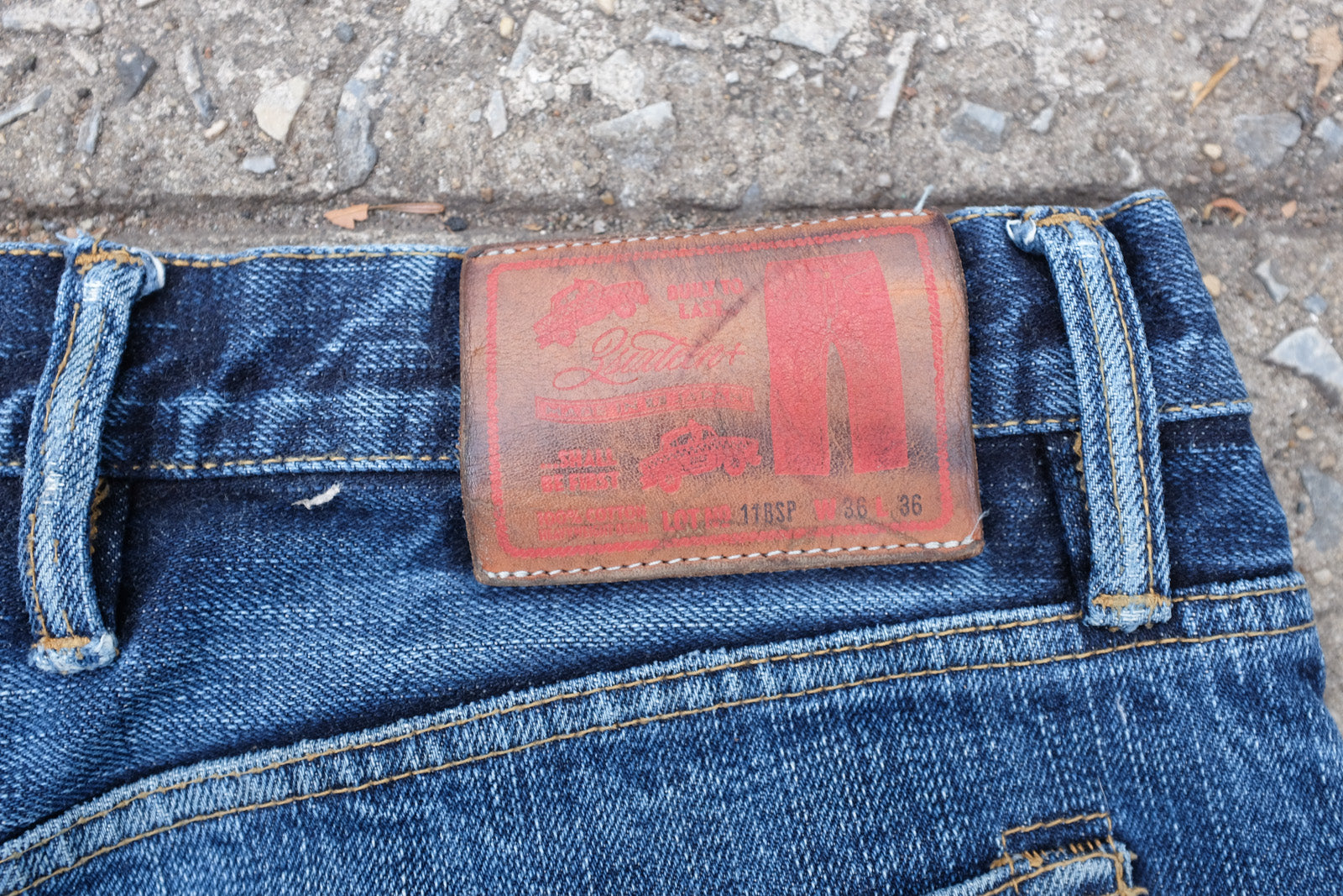 Closeup of 3sixteen 11BSP leather patch showing signs of age.