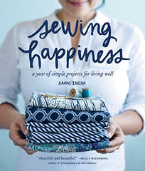 Sewing Happiness, blue fabric held by woman