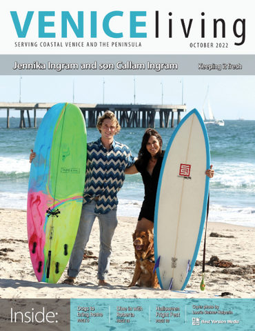 Venice Living Magazine Cover with Jennika Ingram and Callam Ingram, our surfboards and our dog Red Rider, a duck tolling retriever, on the beach