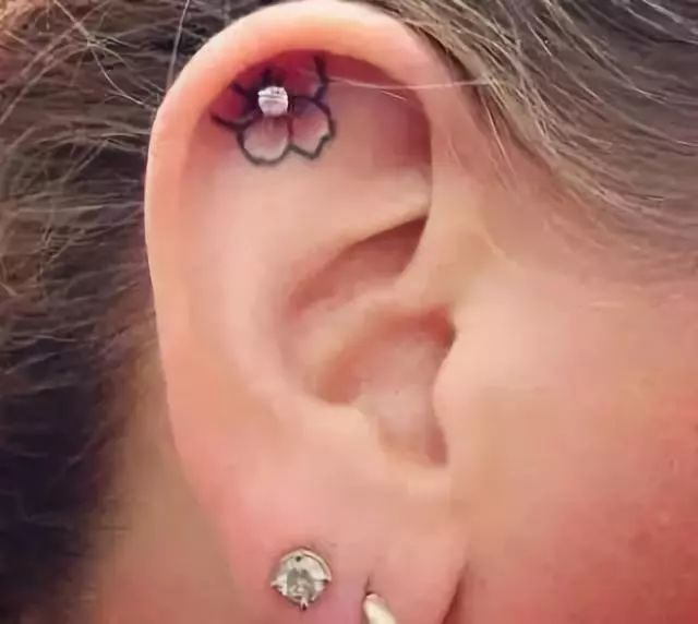 Ear tattoo for girls