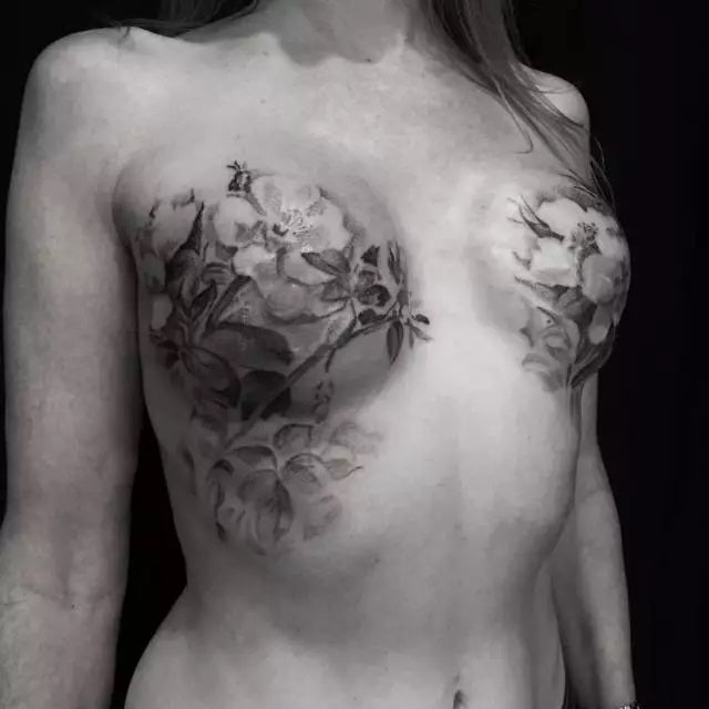 breast tattoo