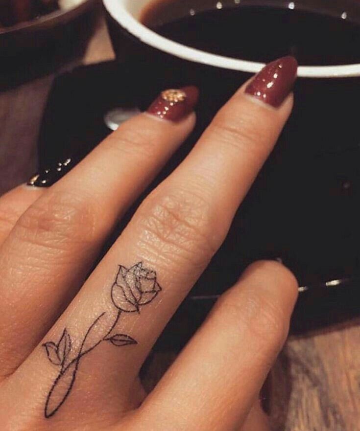 Black Ink Arrow Tattoo On Funky Girl Finger – Truetattoos