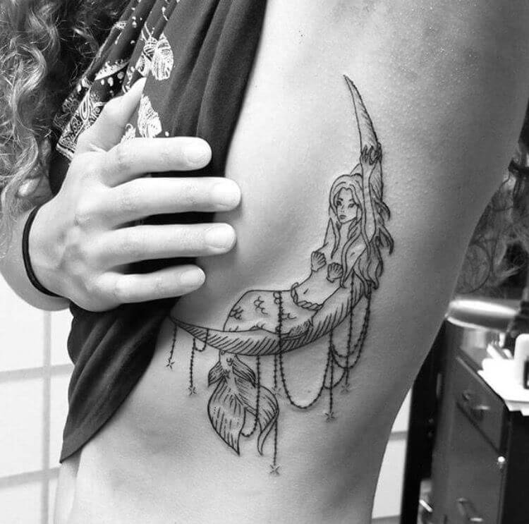 mermaid breast tattoo for women