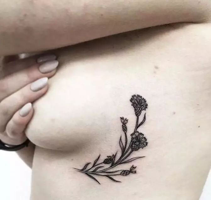 side breast tattoo