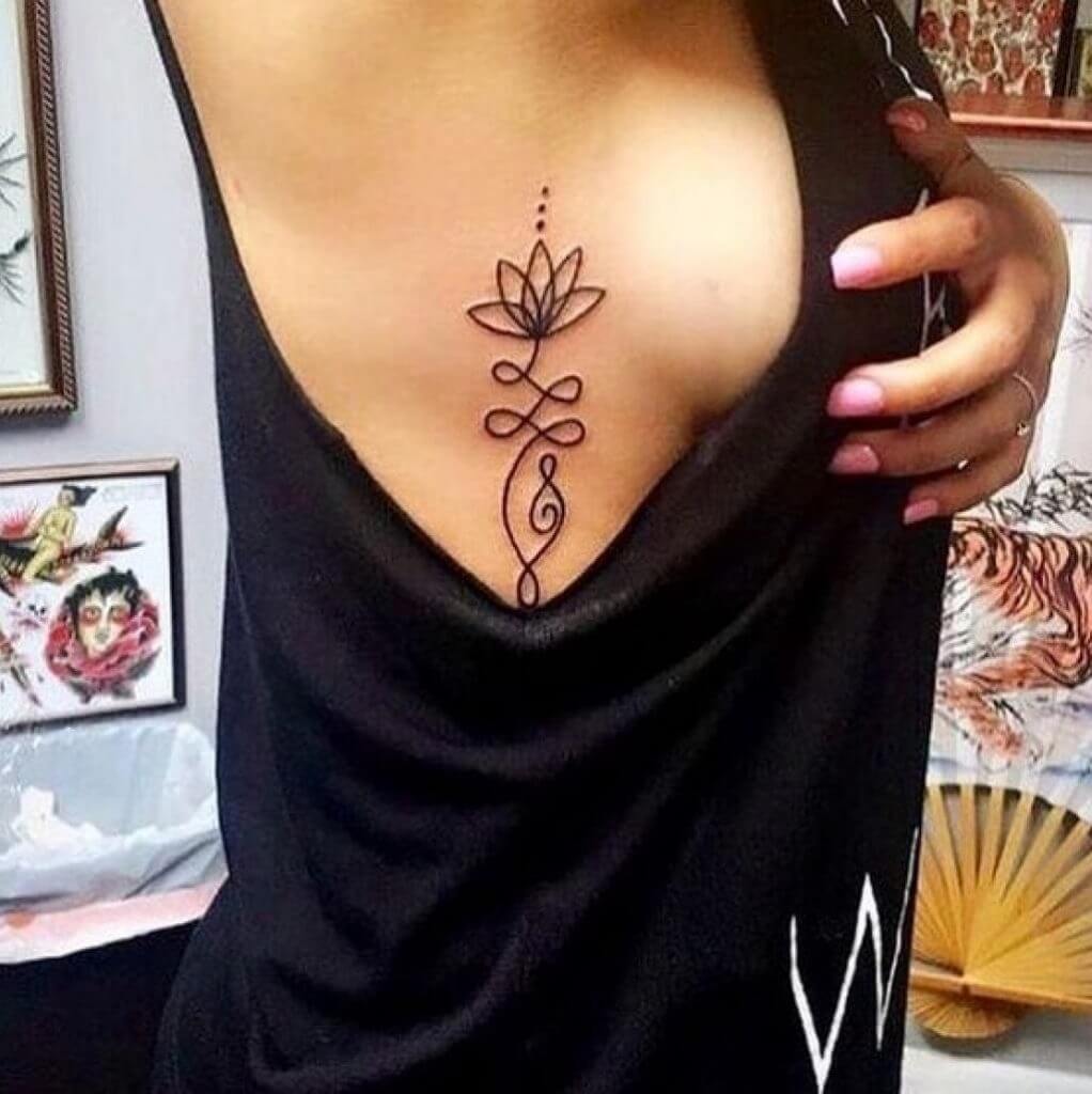 Flower tattoos on the sternum and under the left
