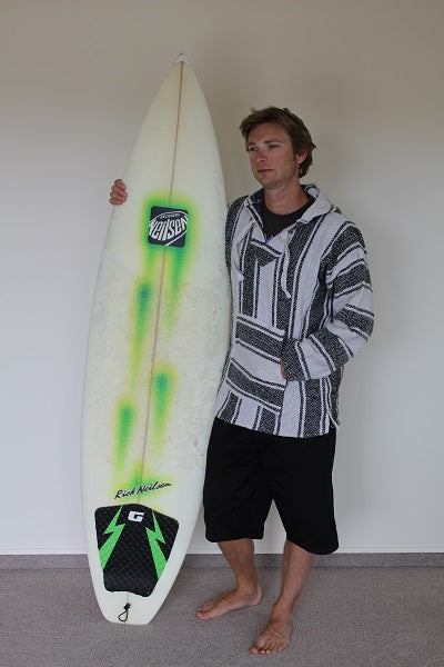 Surfer wearing a Baja Mexican hoodie