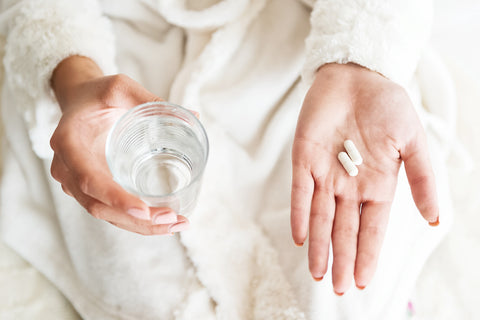 hands holding probiotics