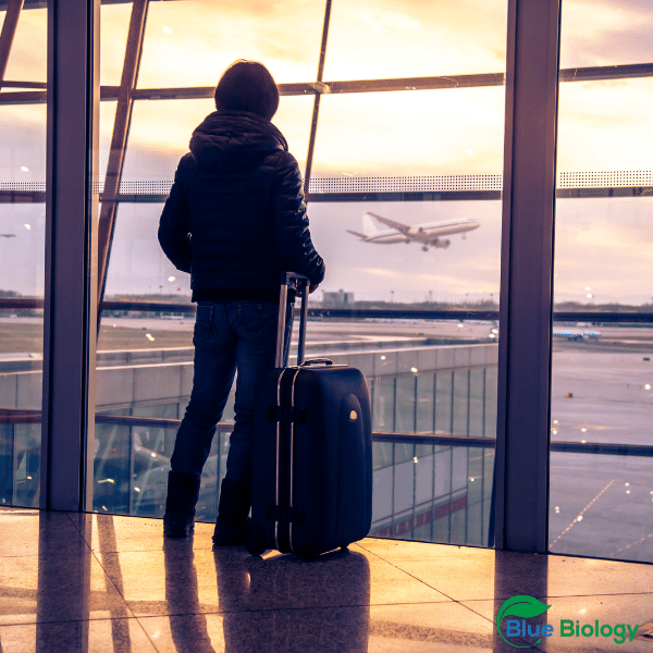 travel bluebiology with logo person in airport