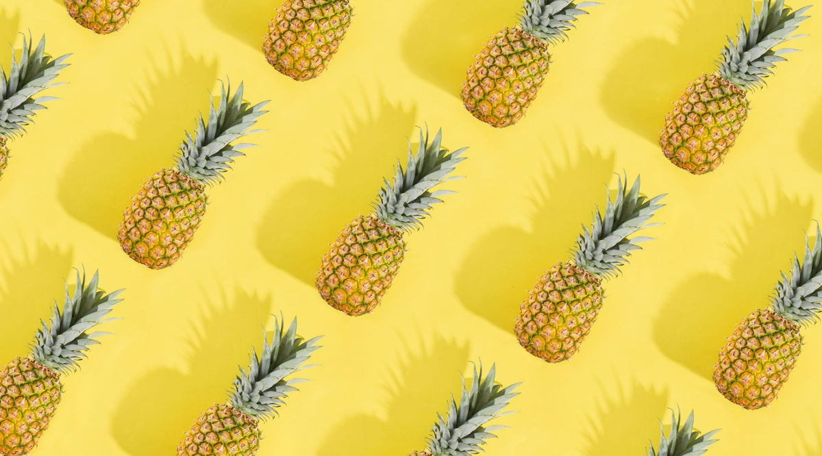 pineapples in pattern on yellow background