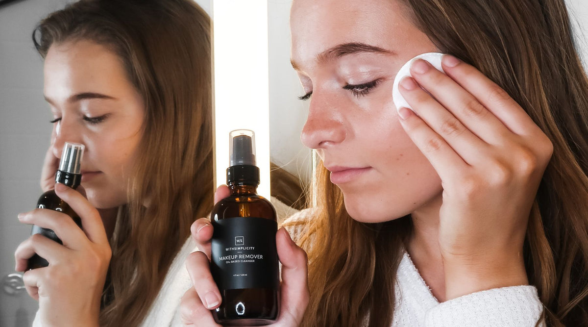 Girl using oil-based makeup remover