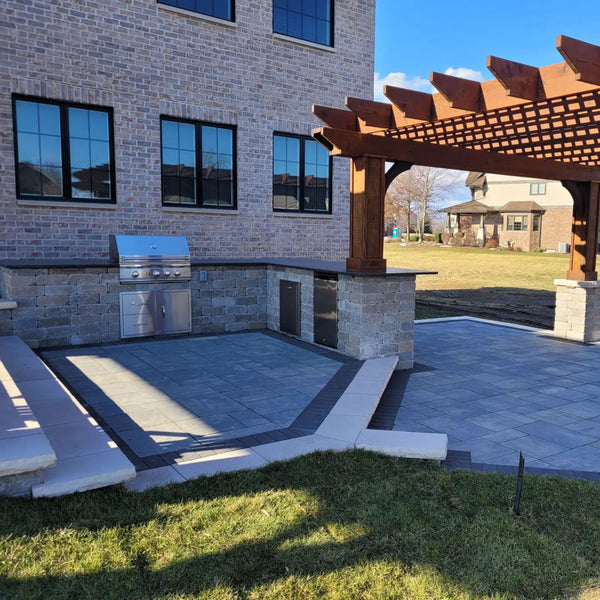 Experience the Charm of Outdoor Living with this Multi-Tiered Paver Patio and Kitchen in Illinois