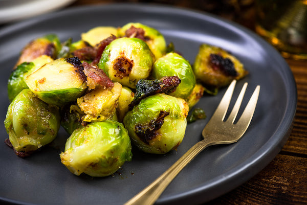 Flame Roasted Brussels Sprouts with Fennel and Serrano Ham