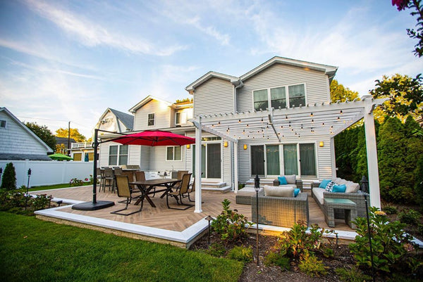 Sleek Kitchen, Charming Pergola, Warm Herringbone Deck, Outdoor Getaway