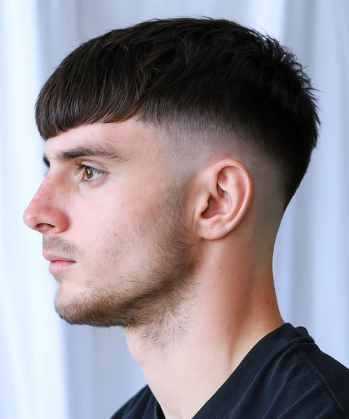 Textured Crop Mid Fade with layered top and sharp taper for edgy, youthful movement.
