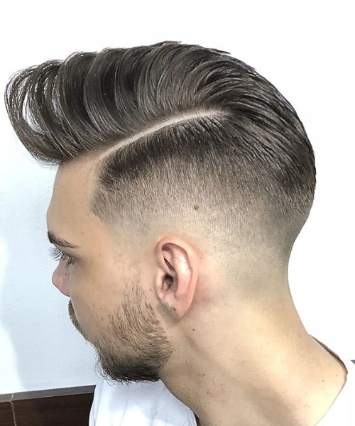 Textured side part hairstyle with layered strands, clean fade, and natural flow on top.