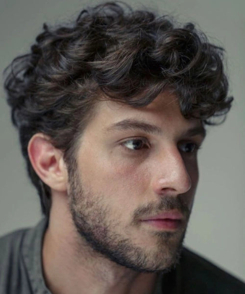 Messy curly hairstyle with loose curls and natural volume