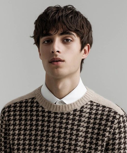 Messy mod cut with layered top, tousled fringe, and natural relaxed volume.