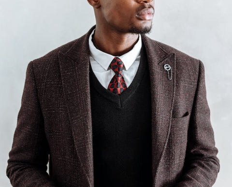 dark brown tweed suit with tie and white dress shirt