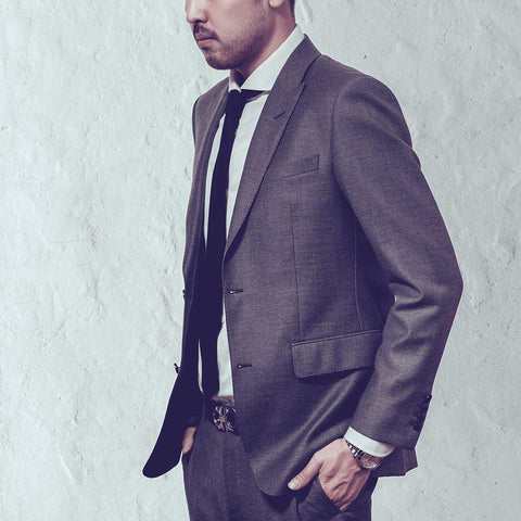 man wearing suit from profile perfect fit