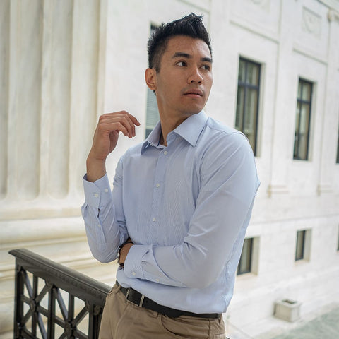 striped dress shirt for men on model in professional attire with khaki pants