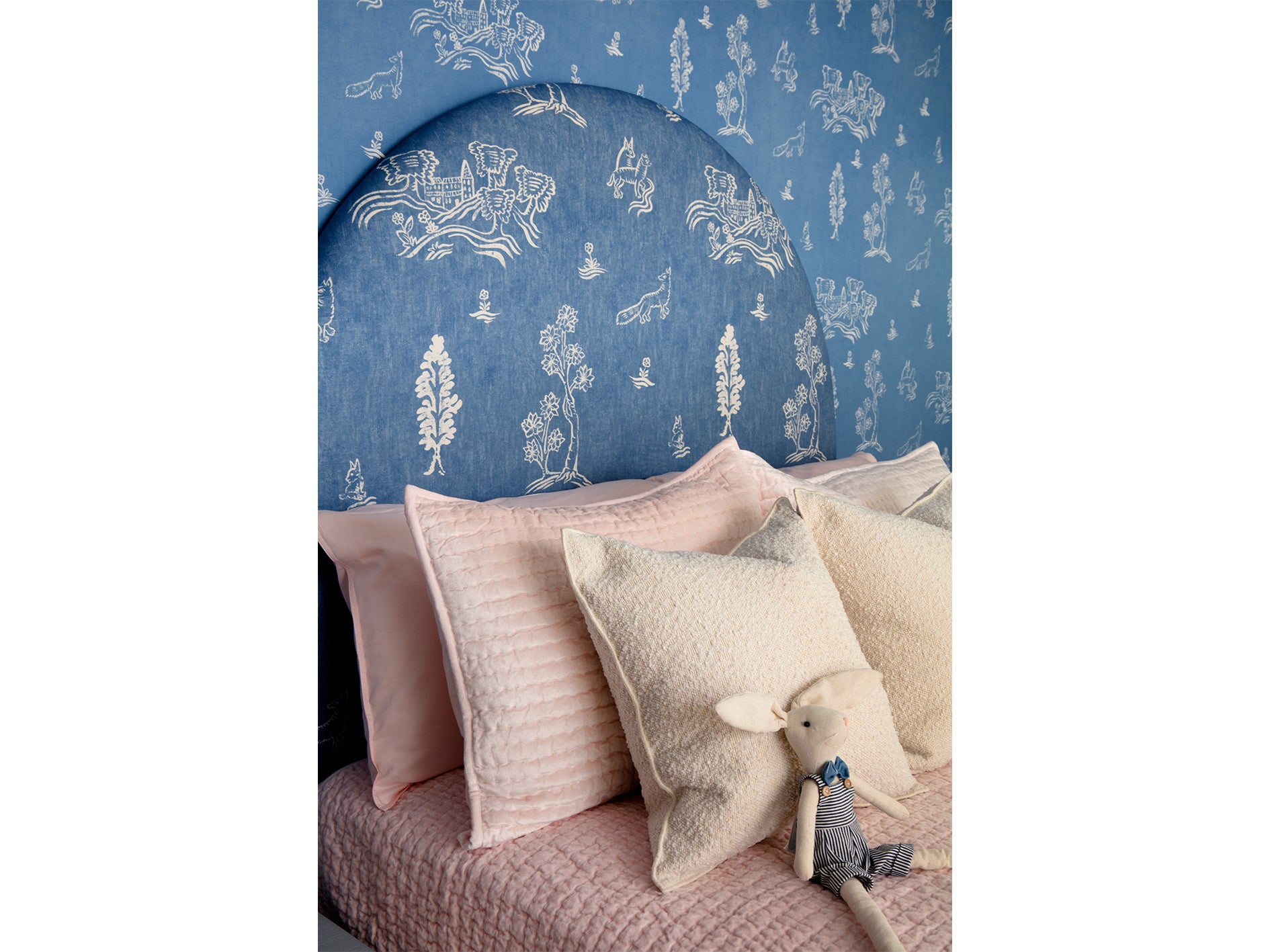 Blue and White Wallpaper and Headboard and Pink Velvet Bedding