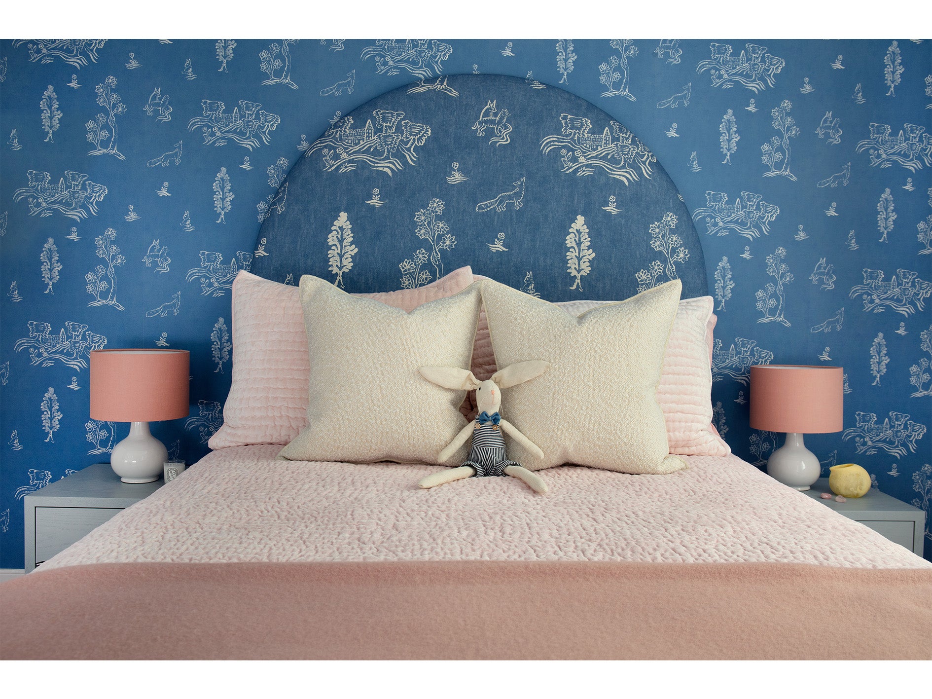 Little Girls Bedroom with Blue Wallpaper and matching Headboard