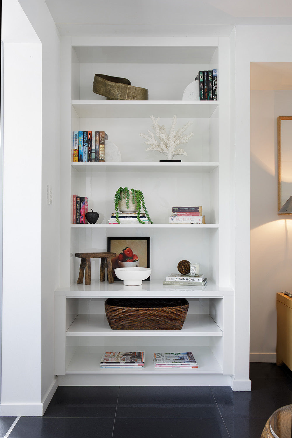 Styling by Rachel Elizabeth Interiors & Textiles. Living room feature built in bookcase with various styling items