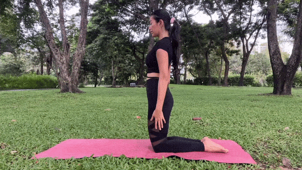 Child's Pose (Balasana): Begin on your hands and knees, then sit back on your heels, extending your arms forward. Rest your forehead on the mat and breathe deeply into your lower back, feeling a gentle stretch.