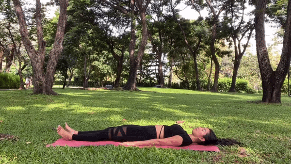 Supine Spinal Twist (Supta Matsyendrasana): Lie on your back, hug your knees into your chest, and then drop them to one side. Extend your arms out to the sides, keeping your shoulders grounded. This twist releases tension in the lower back and stretches the spine.