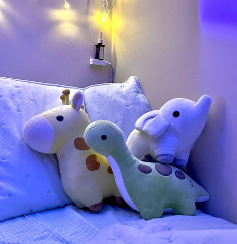 stuffed animals on bed
