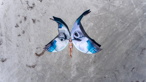 girl and two kiteboards