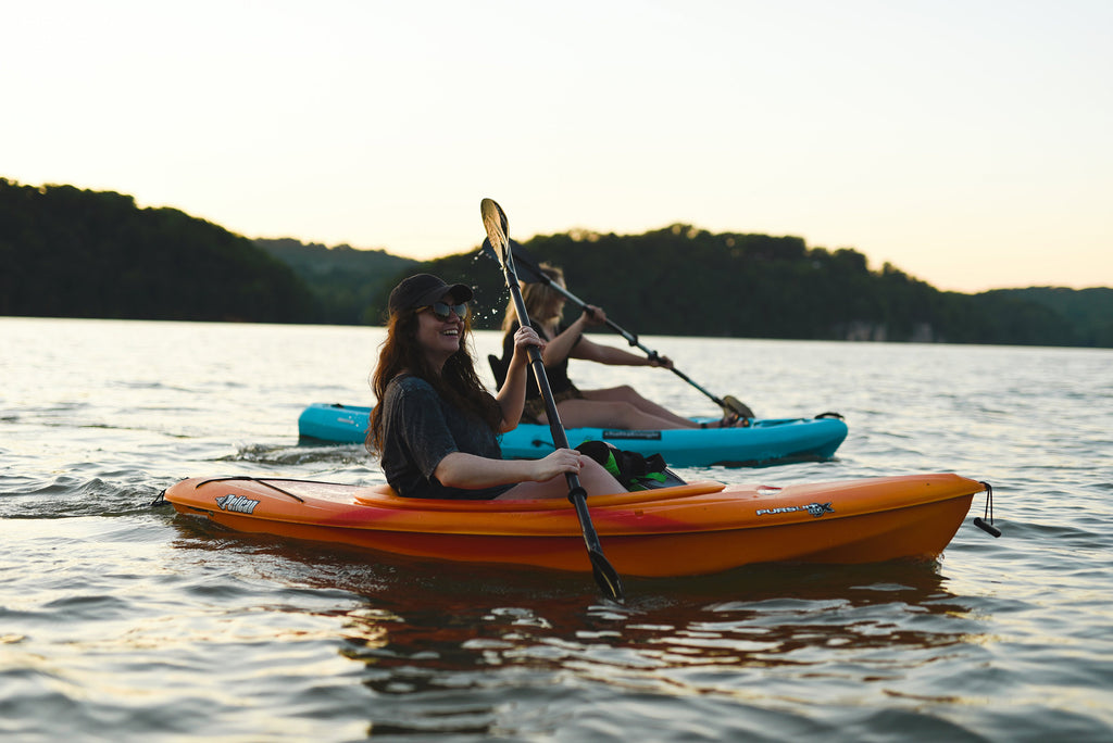 girls kayaking for excercise