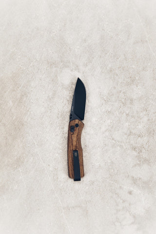 pocket knife on concrete
