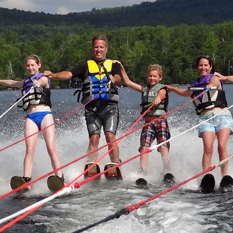water ski family using equipment